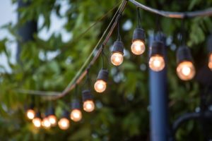 A string of lights can add mellow illumination to your yard