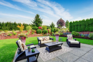 A patio gives you a space where you can relax, entertain, and enjoy your backyard.